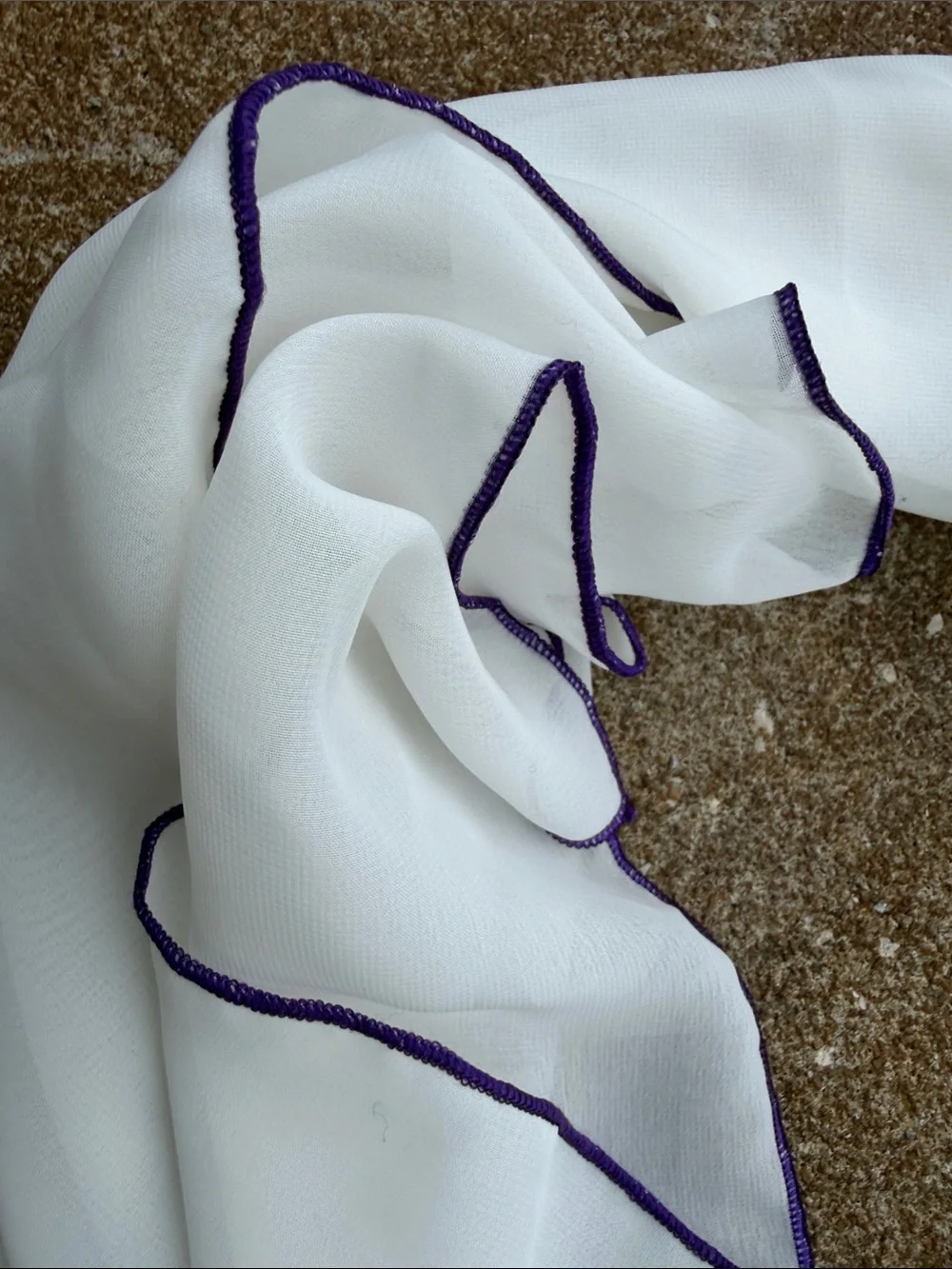 White Chiffon Scarf with Purple Rolled Edge. NWT